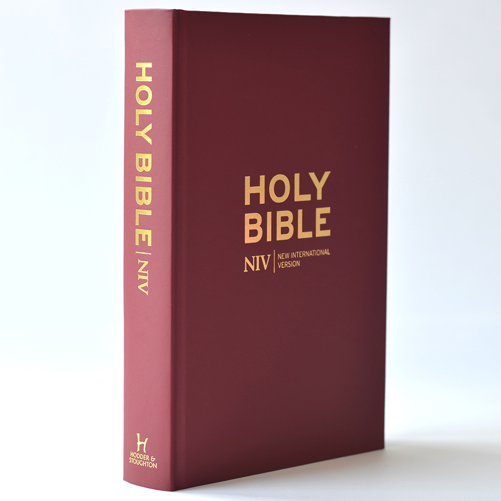 The spine of the burgundy bible.